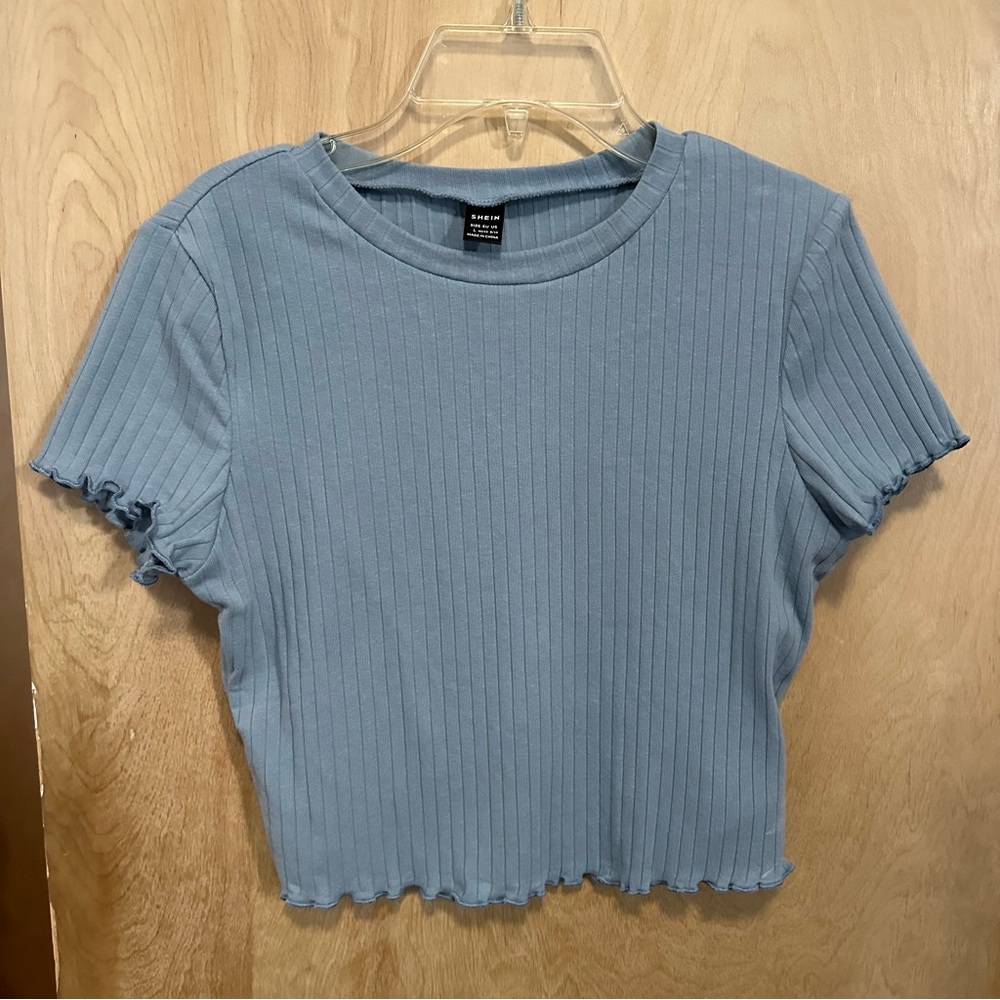 Light blue scalloped rubbed crop top